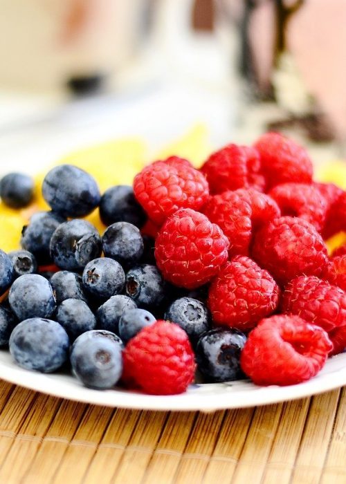 Bowl of fruits, blueberry,and raspberry